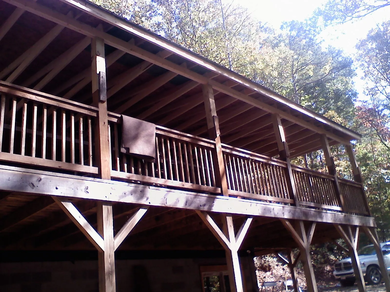 Timber framing under a new elevated porch and deck — Roof Leak Repair in Mendenhall by Roofing Brothers